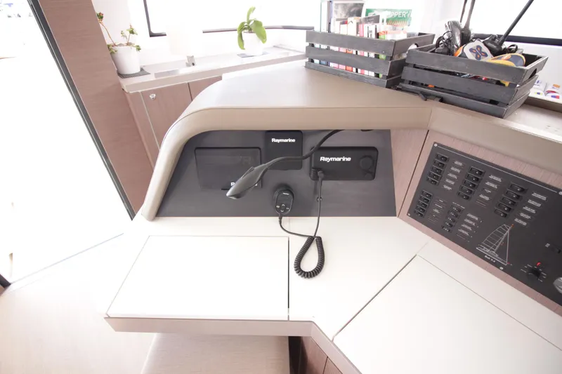 Amura Yacht Photos Pics Helm station of 2021 Bali 5.4 yacht with navigation equipment and control panel.