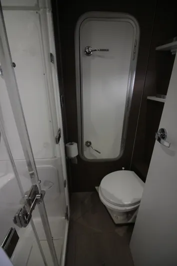 Amura Yacht Photos Pics Compact bathroom in 2021 Bali 5.4 model, featuring shower and toilet.