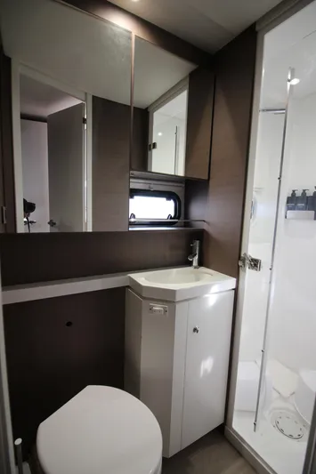 Amura Yacht Photos Pics Modern bathroom in 2021 Bali 5.4 model, featuring sleek design and compact fixtures.