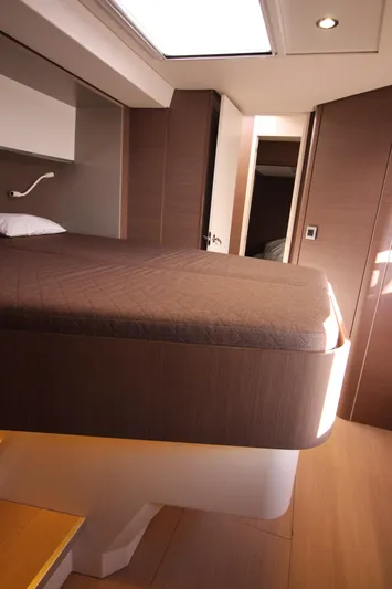 Amura Yacht Photos Pics Interior of 2021 Bali 5.4 yacht cabin with modern design and cozy bed.