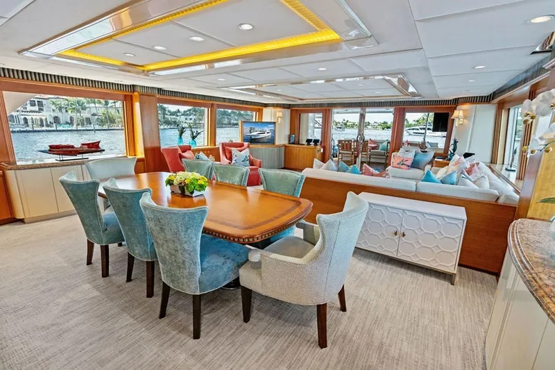 Picosa Lady Yacht Photos Pics Luxurious 2001 West Bay Sonship yacht interior with elegant dining and seating area, waterfront view.