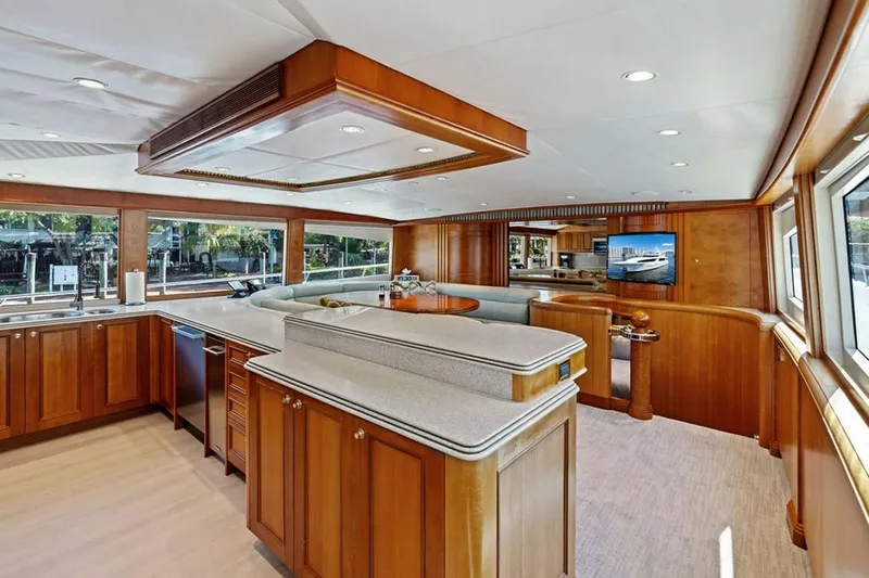 Picosa Lady Yacht Photos Pics Luxurious 2001 West Bay Sonship yacht interior with elegant wood cabinetry and spacious layout.
