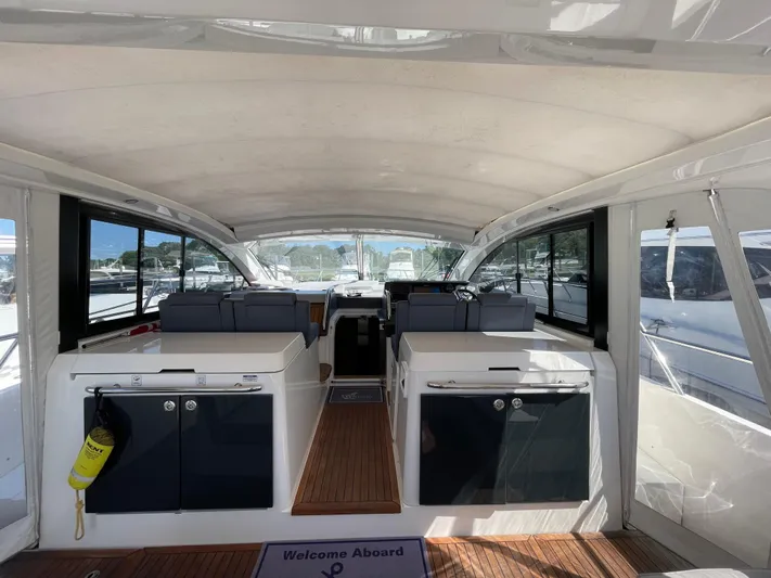 Ohana Yacht Photos Pics Interior view of 2013 Sealine S450 yacht with spacious seating and modern design.