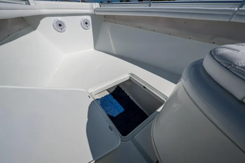 Rock N Reel Yacht Photos Pics 2018 Yellowfin 36 Offshore boat interior with storage compartment and seating.