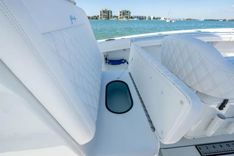 Rock N Reel Yacht Photos Pics 2018 Yellowfin 36 Offshore boat interior with white seating and ocean view.