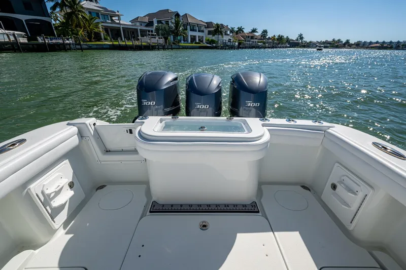Rock N Reel Yacht Photos Pics 2018 Yellowfin 36 Offshore boat with triple 300 horsepower engines on a sunny day.