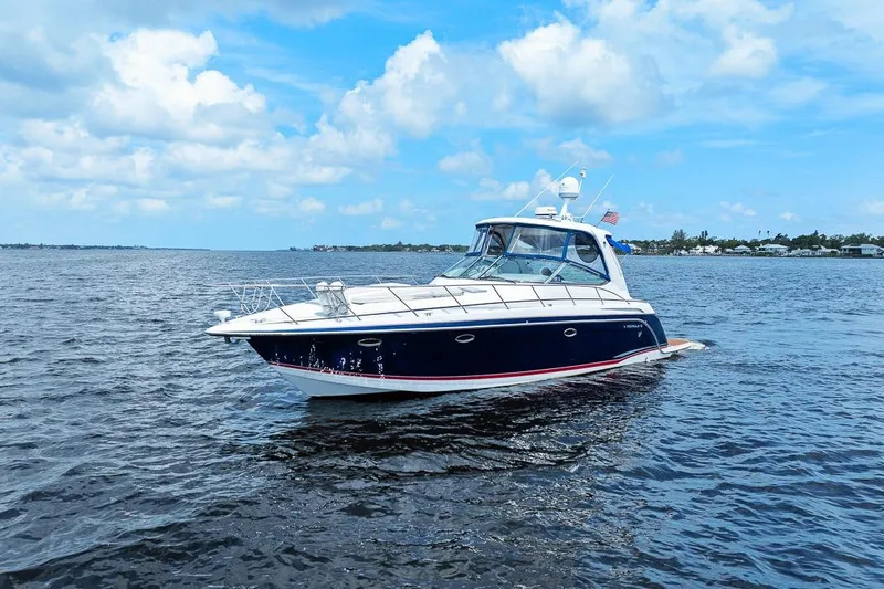 Pura Vida Yacht Photos Pics 2008 Formula 40 Performance Cruiser on open water under a blue sky.