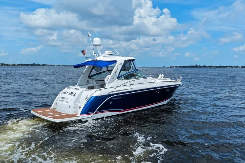 Pura Vida Yacht Photos Pics 2008 Formula 40 Performance Cruiser on open water under blue sky.
