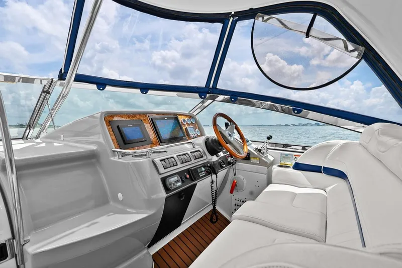 Pura Vida Yacht Photos Pics Interior of 2008 Formula 40 Performance Cruiser with modern dashboard and ocean view.