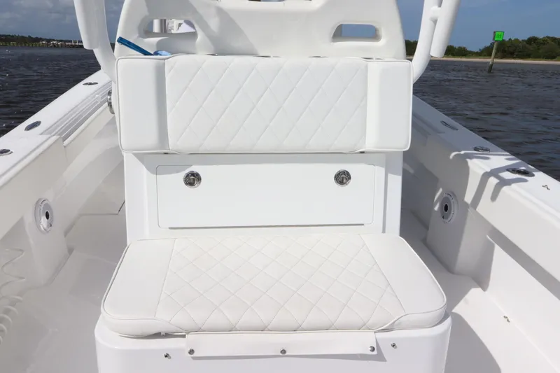  Yacht Photos Pics 2022 Onslow Bay 33 boat interior with white cushioned seating.