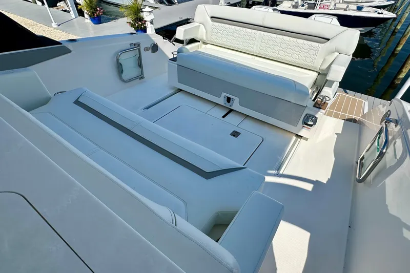  Yacht Photos Pics Luxurious seating area on 2026 Tiara Yachts 34 LS, docked at marina.