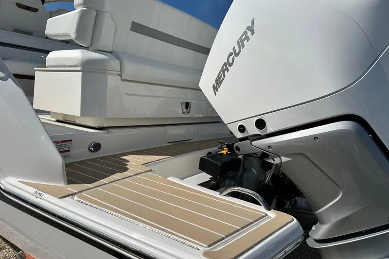  Yacht Photos Pics 2026 Tiara Yachts 34 LS with Mercury engine, featuring sleek deck design.