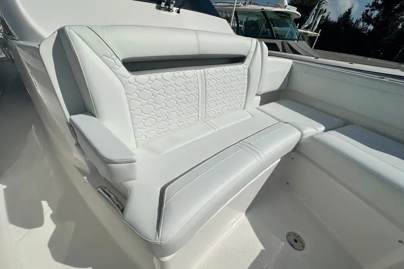  Yacht Photos Pics Luxurious seating on 2026 Tiara Yachts 34 LS, featuring elegant white upholstery.