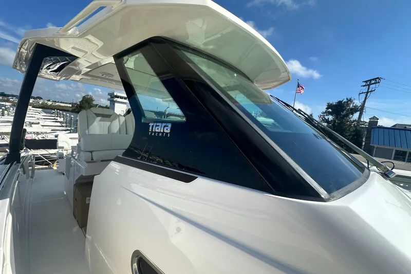  Yacht Photos Pics 2026 Tiara Yachts 34 LS luxury boat with sleek design and spacious deck.