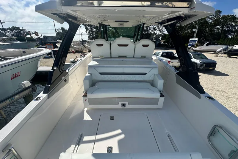  Yacht Photos Pics 2026 Tiara Yachts 34 LS boat interior with seating and modern design.