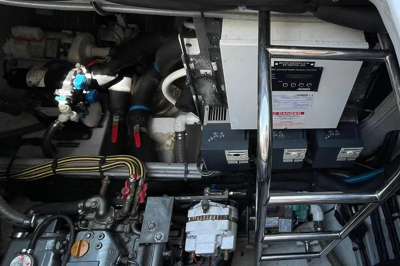 Somni Yacht Photos Pics Engine room of 2013 Lagoon 560 S2 yacht, showcasing mechanical components and control systems.