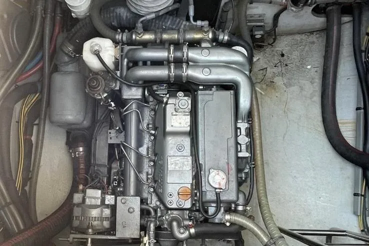 Somni Yacht Photos Pics Engine compartment of a 2013 Lagoon 560 S2 yacht, showcasing detailed mechanical components.