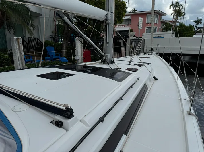 Pura Vida Yacht Photos Pics 2022 Dufour 530 sailboat deck with sleek design and modern fittings.