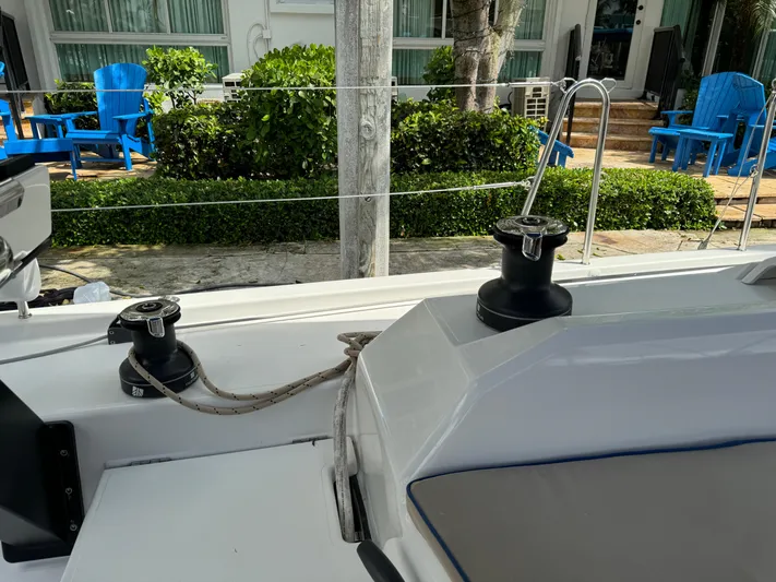 Pura Vida Yacht Photos Pics Deck view of 2022 Dufour 530 sailboat with winches and outdoor seating area.