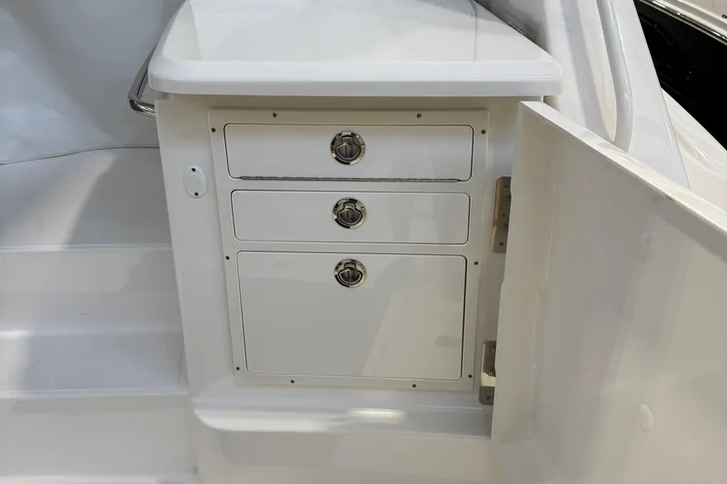  Yacht Photos Pics 2023 Tiara Yachts 43 Open interior storage drawers with sleek design.