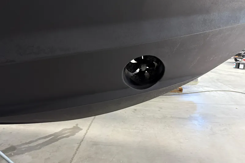  Yacht Photos Pics 2023 Tiara Yachts 43 Open hull with bow thruster in a workshop.