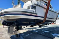 2018 Nimbus 365 boat lifted for maintenance, showcasing hull and propeller.