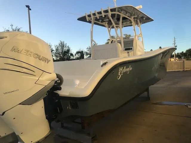  Yacht Photos Pics 2019 Yellowfin 34 Offshore boat with Mercury engine, docked outdoors.