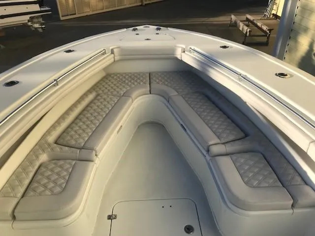  Yacht Photos Pics 2019 Yellowfin 34 Offshore boat with spacious cushioned seating area.