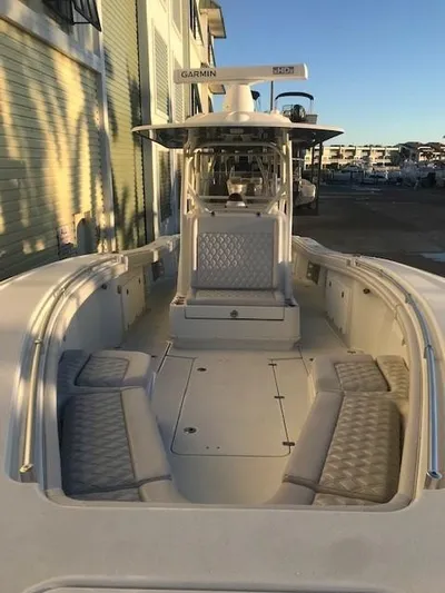 Yacht Photos Pics 2019 Yellowfin 34 Offshore boat with spacious seating and advanced navigation equipment.