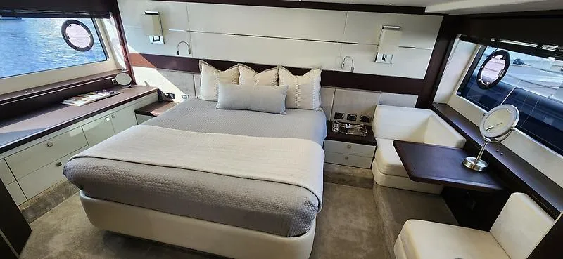 Yacht Photos Pics Luxurious bedroom interior of 2020 Sunseeker Predator 74 XPS yacht with modern furnishings.