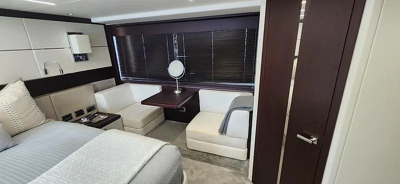  Yacht Photos Pics Luxurious interior of 2020 Sunseeker Predator 74 XPS yacht cabin with modern furnishings.