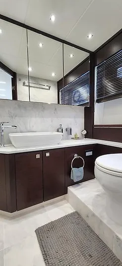  Yacht Photos Pics Luxurious bathroom in 2020 Sunseeker Predator 74 XPS yacht with modern fixtures and elegant design.