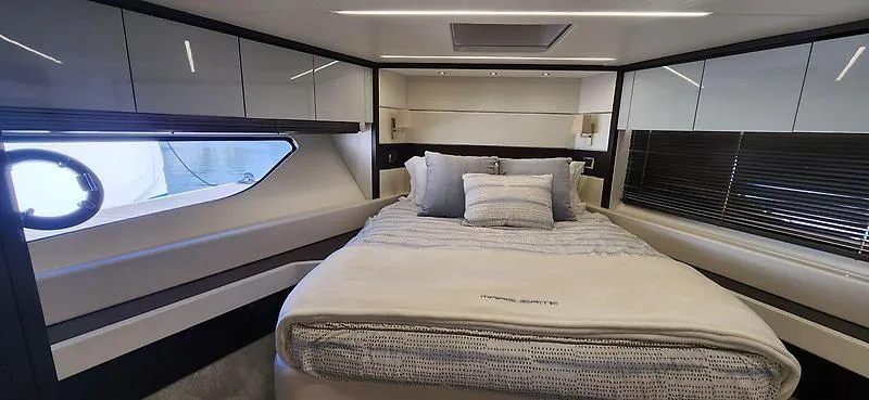  Yacht Photos Pics Luxurious bedroom interior of 2020 Sunseeker Predator 74 XPS yacht with modern design.