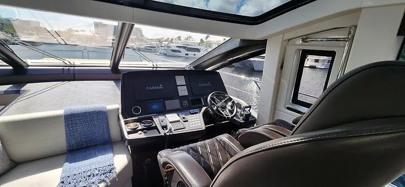  Yacht Photos Pics Luxurious 2020 Sunseeker Predator 74 XPS yacht cockpit with modern navigation equipment.