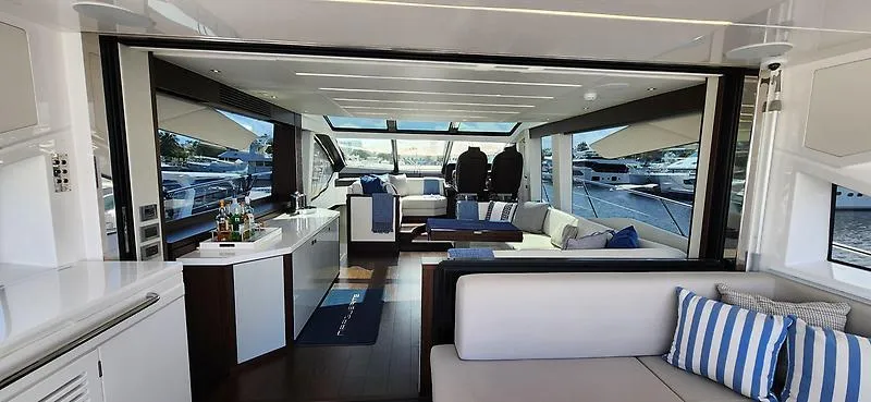  Yacht Photos Pics Luxurious interior of 2020 Sunseeker Predator 74 XPS yacht with modern seating and decor.
