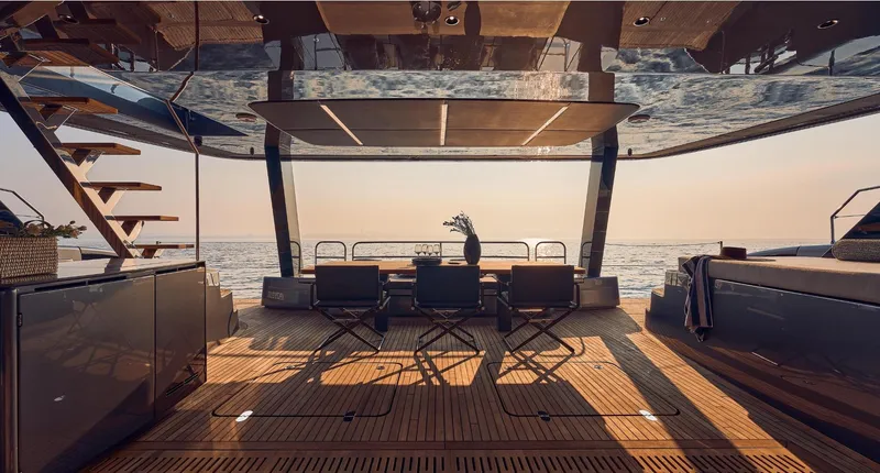  Yacht Photos Pics Luxurious Sunreef 60 Power yacht deck with elegant seating, overlooking serene ocean view.