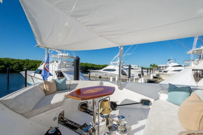 Lucky Penny Yacht Photos Pics Luxurious 2014 Hargrave Sky Lounge yacht interior with plush seating and marina view.