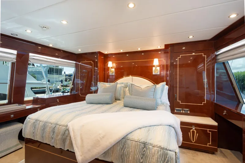 Lucky Penny Yacht Photos Pics Luxurious bedroom interior on 2014 Hargrave Sky Lounge yacht with elegant wood finishes.