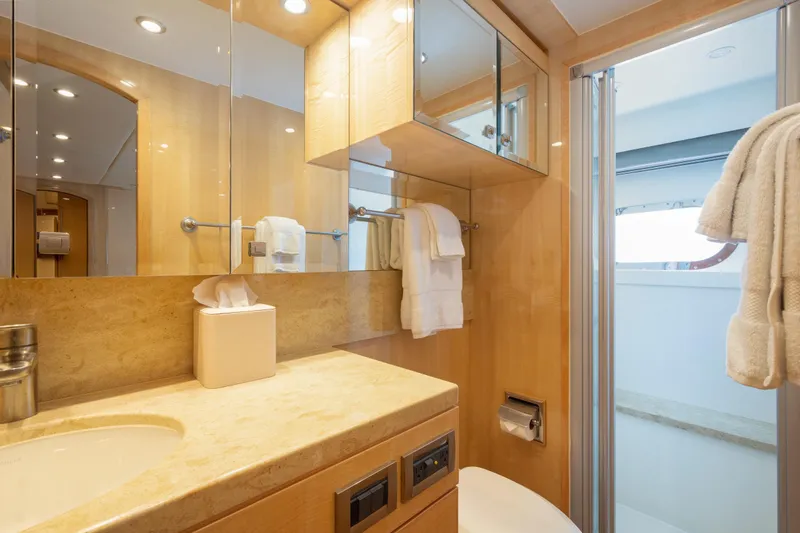 Lucky Penny Yacht Photos Pics Luxurious bathroom in 2014 Hargrave Sky Lounge yacht with elegant wood finishes.