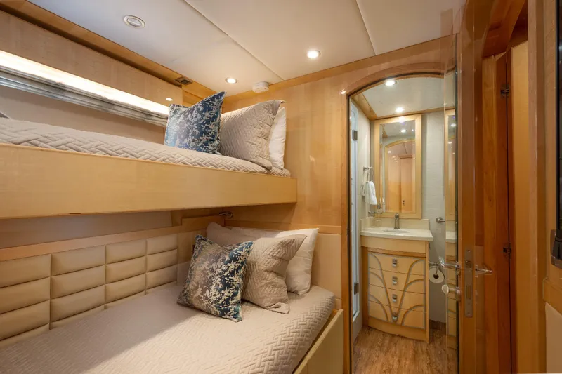 Lucky Penny Yacht Photos Pics Luxurious 2014 Hargrave Sky Lounge yacht cabin with bunk beds and ensuite bathroom.