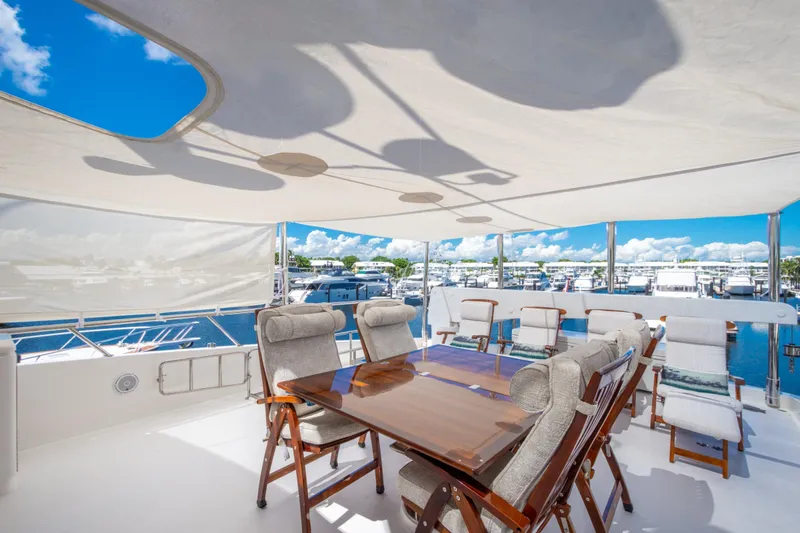 Lucky Penny Yacht Photos Pics Luxurious 2014 Hargrave Sky Lounge yacht deck with elegant seating and marina view.
