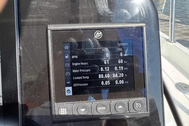  Yacht Photos Pics Display screen on 2024 Beneteau Antares 11 showing engine metrics and system status.