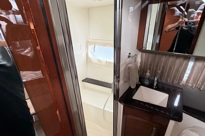 Mj Yacht Photos Pics Luxurious bathroom in 2019 Carver C34 yacht with modern fixtures and elegant design.