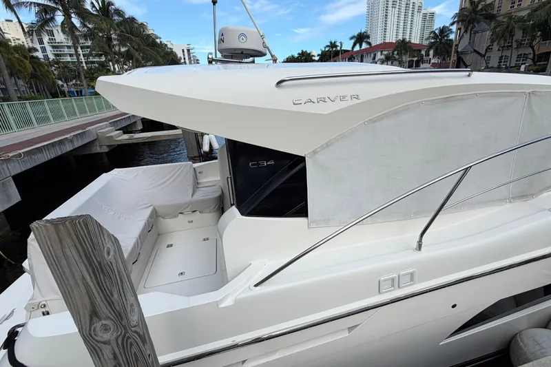 Mj Yacht Photos Pics 2019 Carver C34 yacht docked, featuring sleek design and modern amenities.