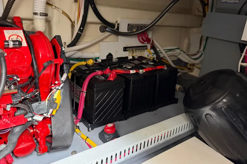 Mj Yacht Photos Pics Engine room of 2019 Carver C34 with battery and wiring components.