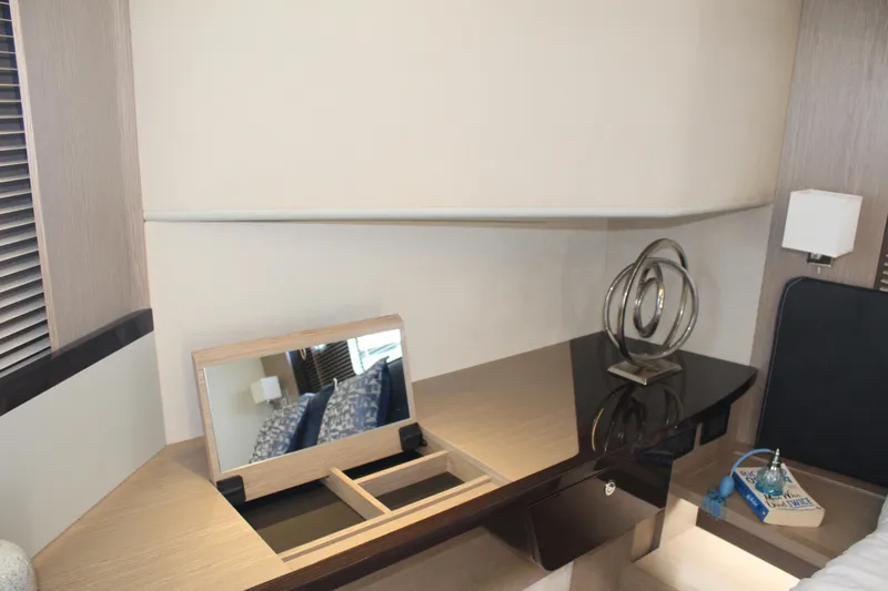 In Stock Yacht Photos Pics Luxurious interior of 2025 Absolute 47 Fly yacht with modern decor and sleek furnishings.