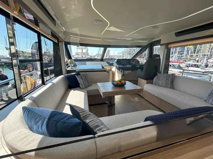 In Stock Yacht Photos Pics Luxurious interior of 2025 Absolute 47 Fly yacht with spacious seating and modern design.