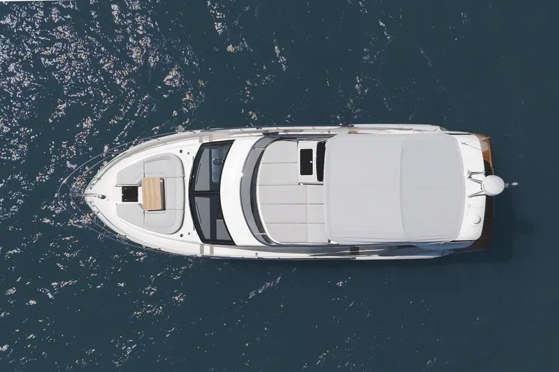 In Stock Yacht Photos Pics Overhead view of 2025 Absolute 47 Fly yacht on open water.