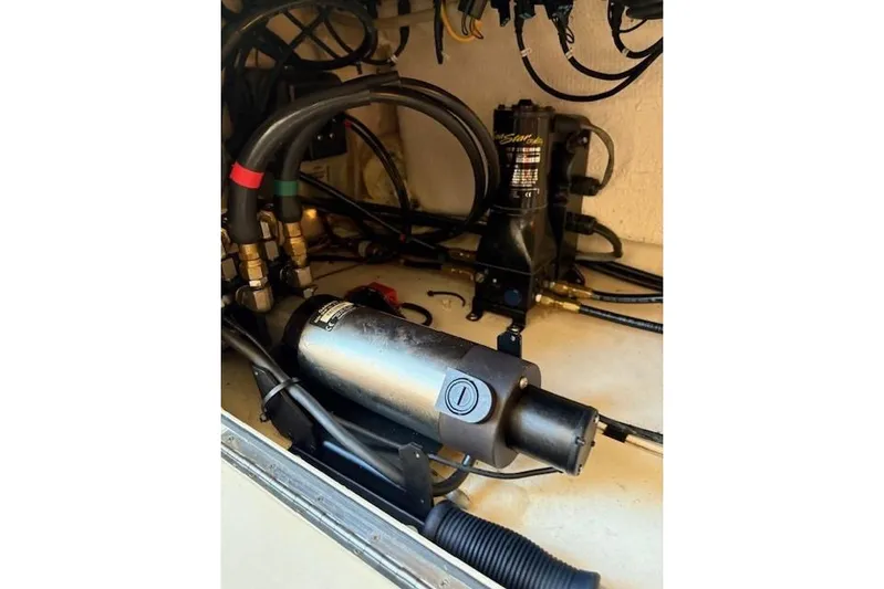  Yacht Photos Pics 2013 Grady-White Canyon 336 boat engine compartment with hydraulic components and wiring.