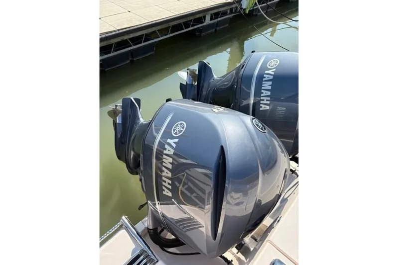  Yacht Photos Pics Twin Yamaha outboard engines on a 2013 Grady-White Canyon 336 boat at a dock.